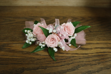 Pastel Pink Corsage from Kelley's Florist in Lake Placid, FL